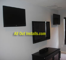 AllOutInstalls.com 3 Flat Screen TV mounted on wall