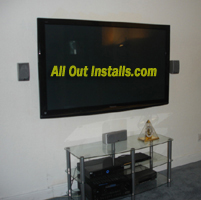 AllOutInstalls.com Flat Screen TV and Speakers mounted on wall