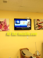AllOutInstalls.com Flat Screen Digital Advertising TV mounted on wall