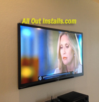 AllOutInstalls.com Flat panel TV mounted on wall